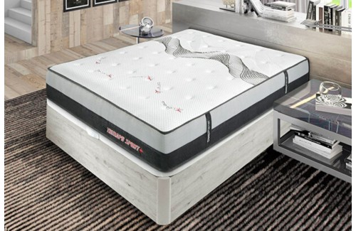 Colchón Therapy Sport con capas visibles de espuma y muelles, tapizado blanco con detalles amarillos 2