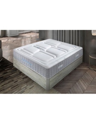 Colchón INFINITY blanco con canales de ventilación y base gris, diseño moderno para descanso superior