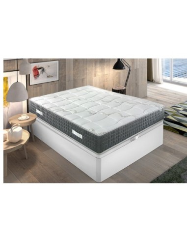 Colchón IDENTITY viscoelástico gris y blanco en cama tapizada, dormitorio moderno